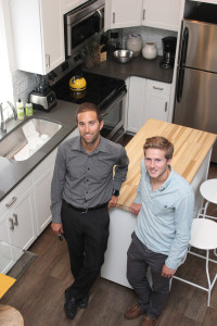 From left, Adam Rosen, DSCDO economic development director, and Adam Davenport, DSCDO project manager, stand in the kitchen.