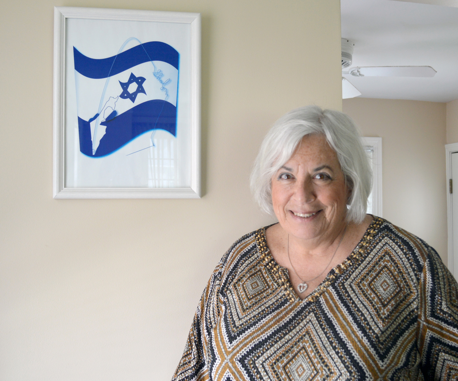 Susan Kellner, pictured in her Shaker Heights home, sued her employer, the federal government, for anti-Semitic discrimination.