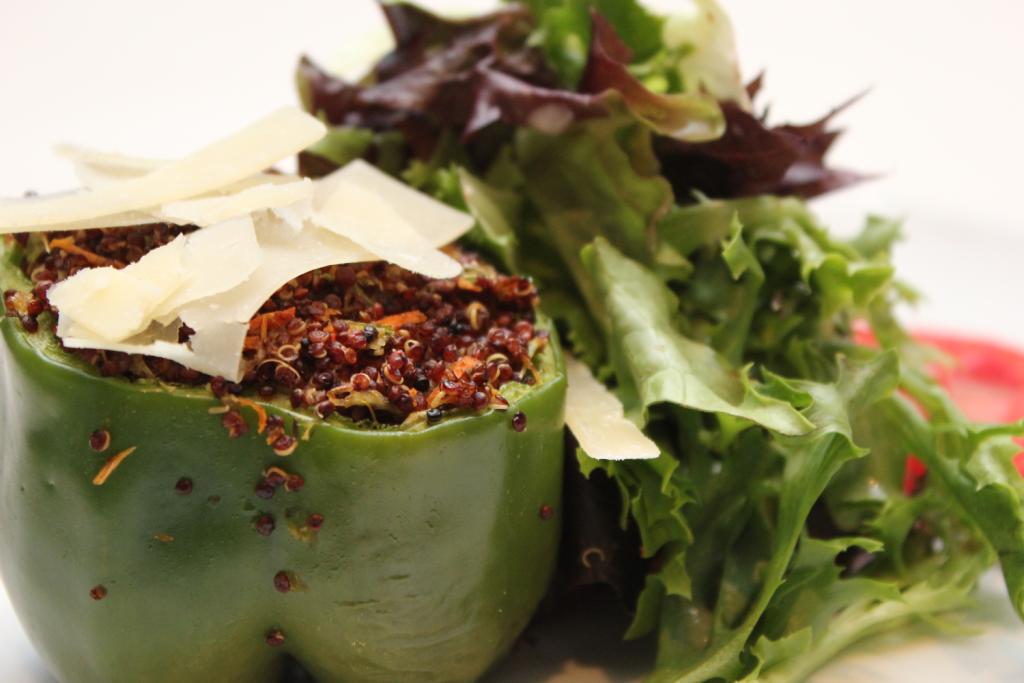 Provenance Café’s red quinoa, wild mushroom and parmesan stuffed pepper with local greens and tomatoes. 