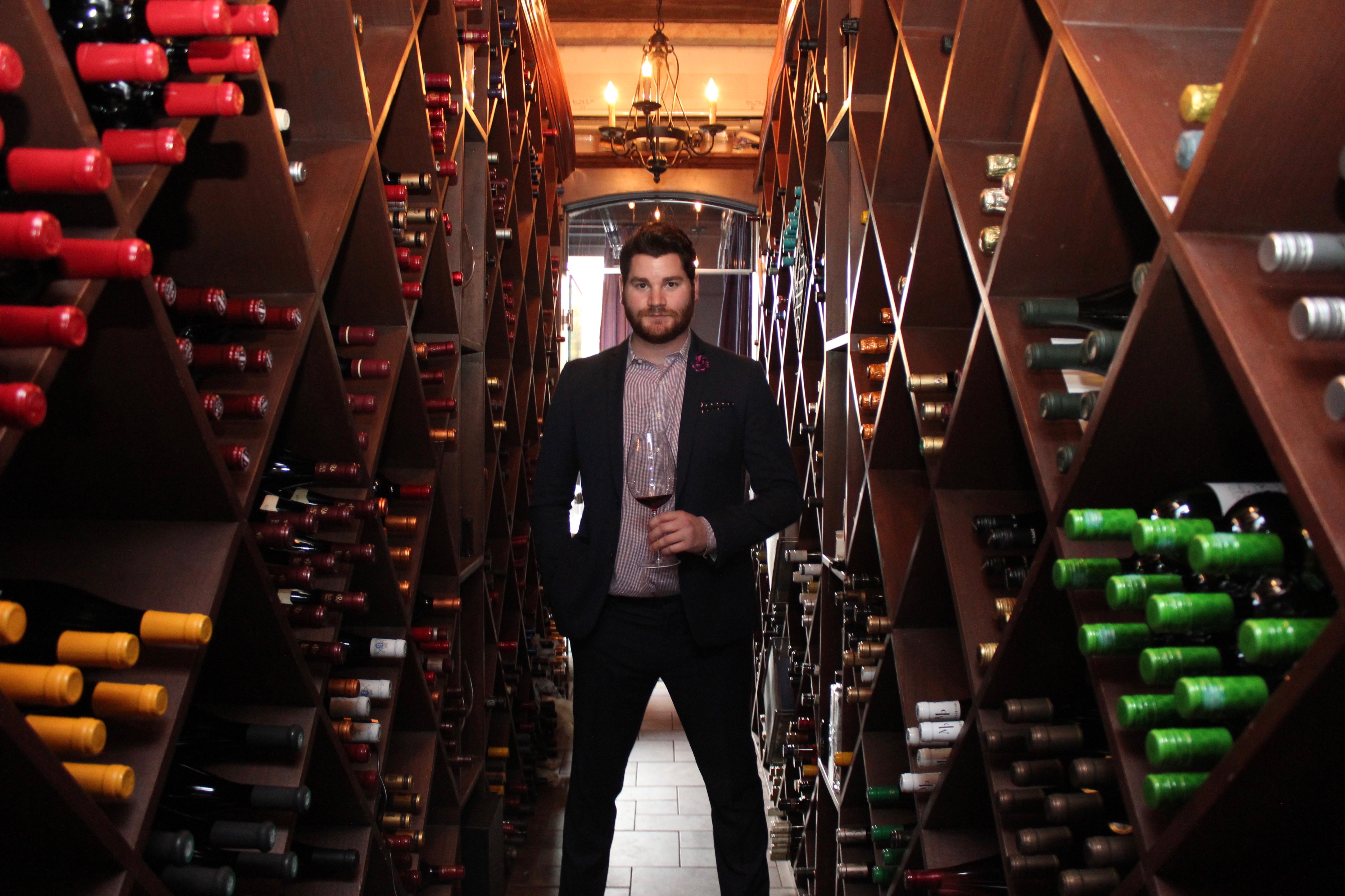 Alexander Carlin, wine director at EDWINS Leadership & Restaurant Institute, has many options from which to choose at the Cleveland restaurant.