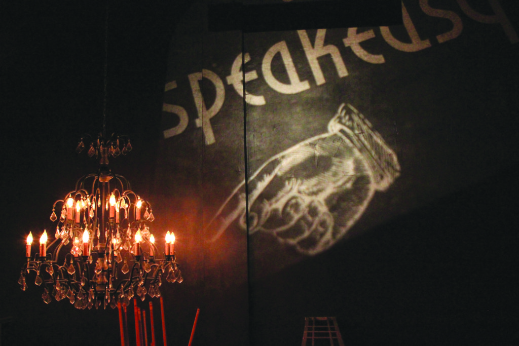 ; Visitors know Speakeasy is open when the chandelier at the back of McNulty's Bier Markt is illuminated
